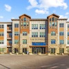 front of a building with windows and entrance