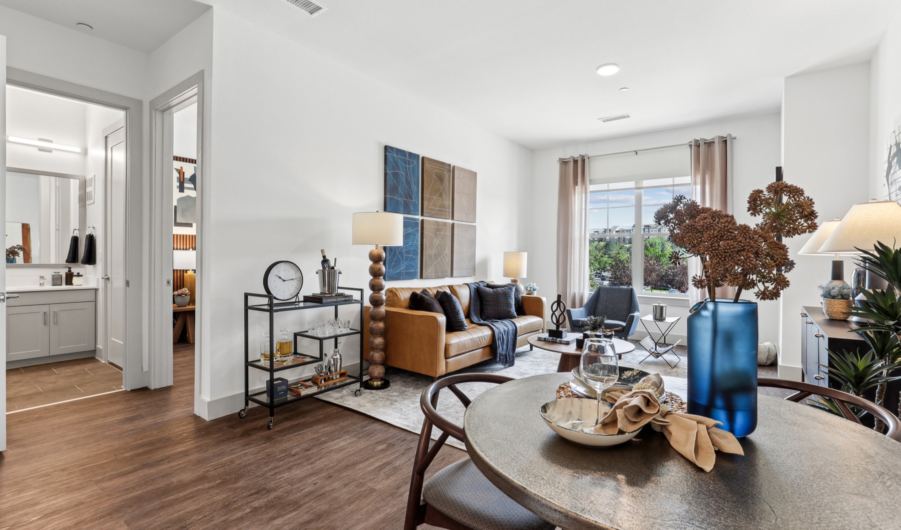 a living room with couch and table