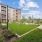 outdoor green space with cornhole