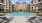 outdoor pool with lounge chairs